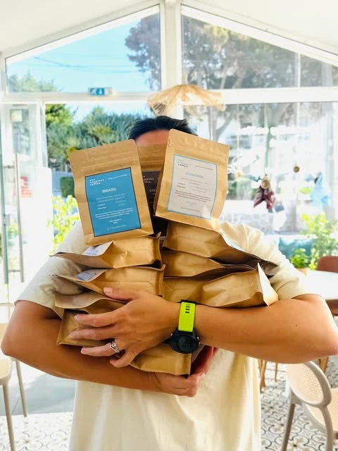 Caixas de takeaway da The Happiest Coffee